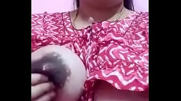 Play Tamil mom milking her boobs